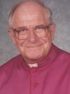 Rev. Msgr. Alexander  Manly